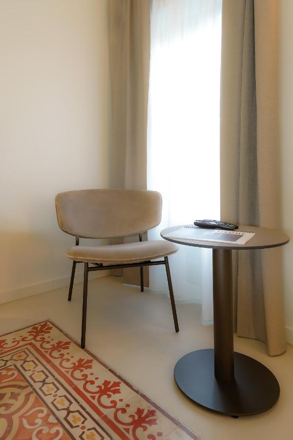 Bergamo Inn 21 Exterior photo A chair